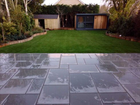 Artificial grass and paving slabs