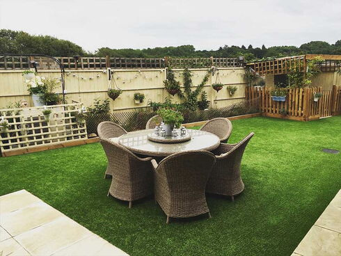 Wicker patio set on artificial grass