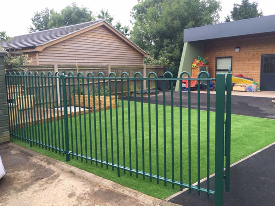 Family home with artificial grass and play area